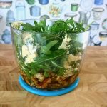 Making rocket pesto in a stick blender mini processor with walnuts and blue cheese