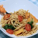 Child's portion of traffic light spaghetti featuring red, orange and green vegetables